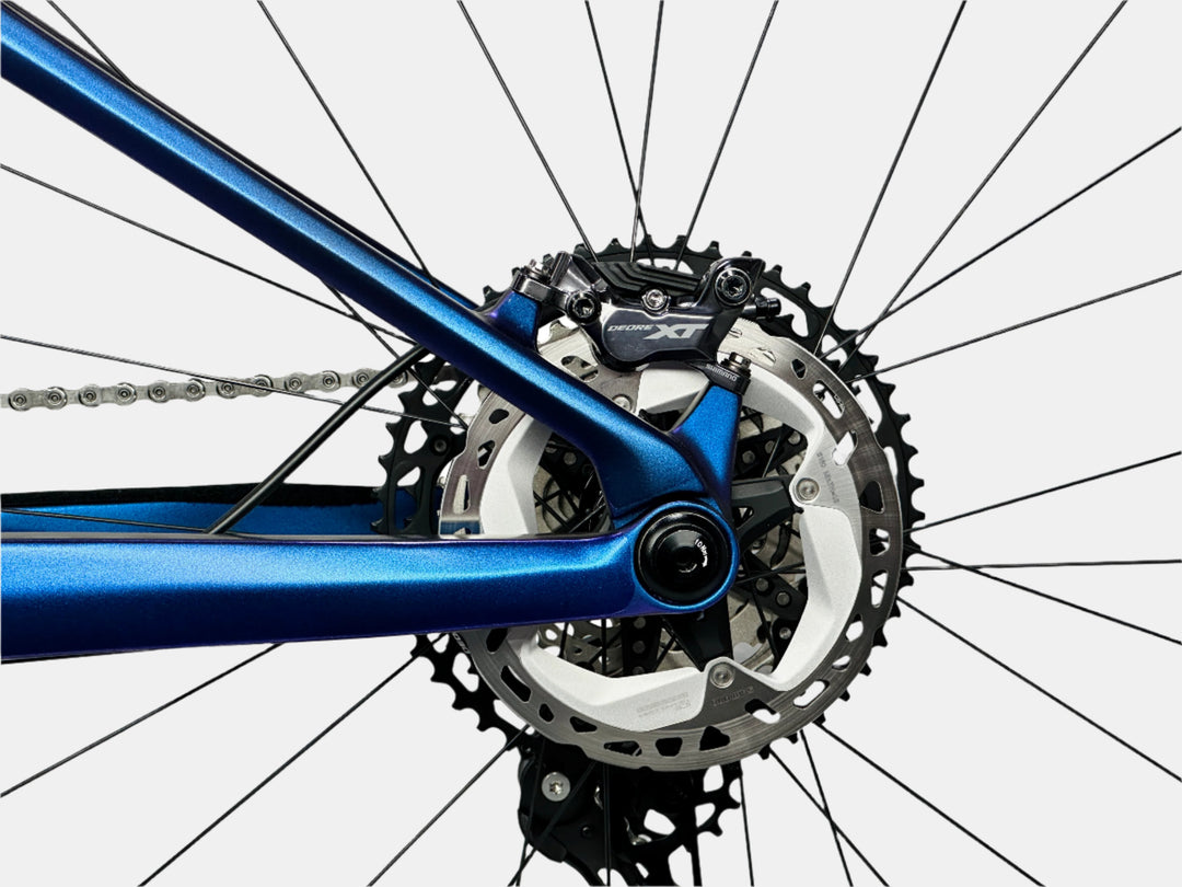 Rear end of a Jibe Jester showcasing Shimano XT rotors and brakes