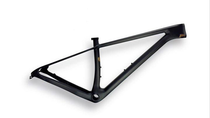 Jibe XCHT carbon fiber frame in the color El Dorado. A raw carbon with gold decals.