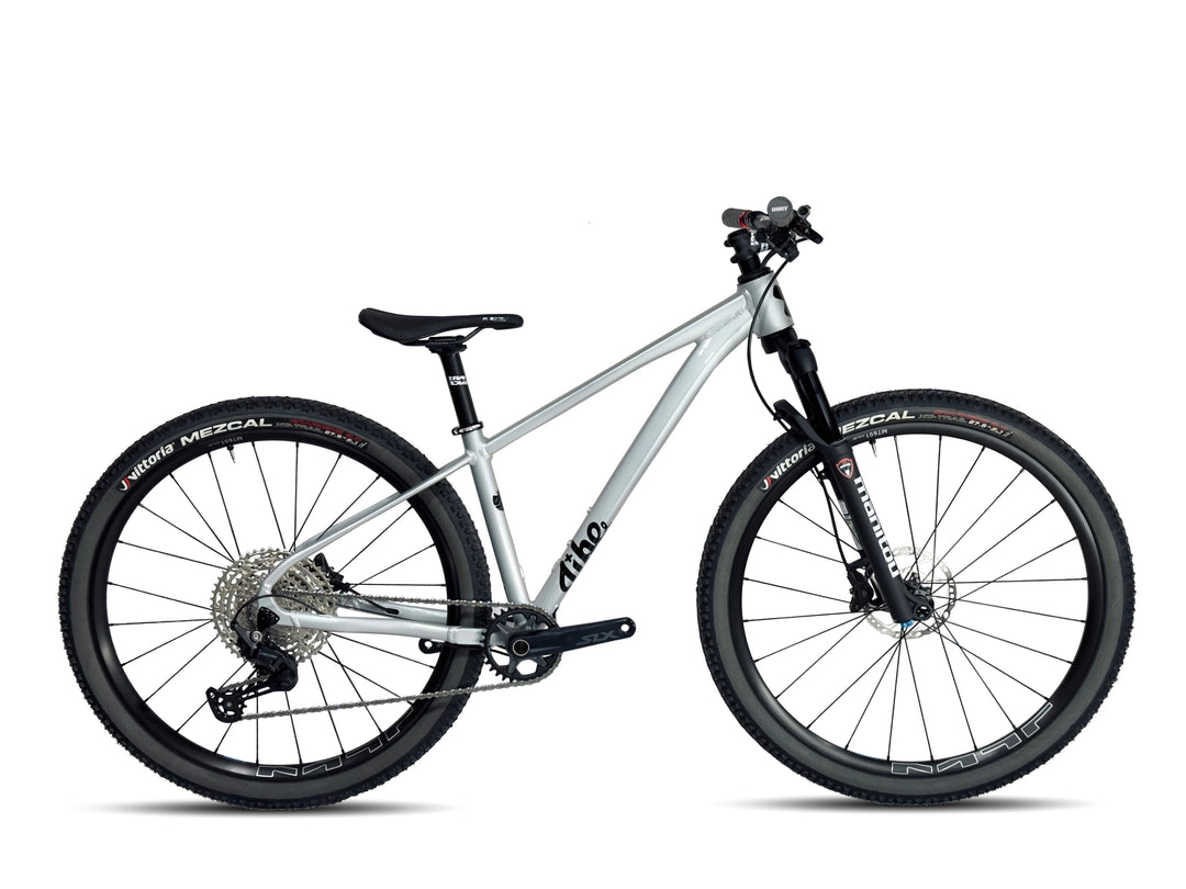 Jibe Firecracker complete bike in the color Moonlight with a Shimano Deore 12 speed build. 