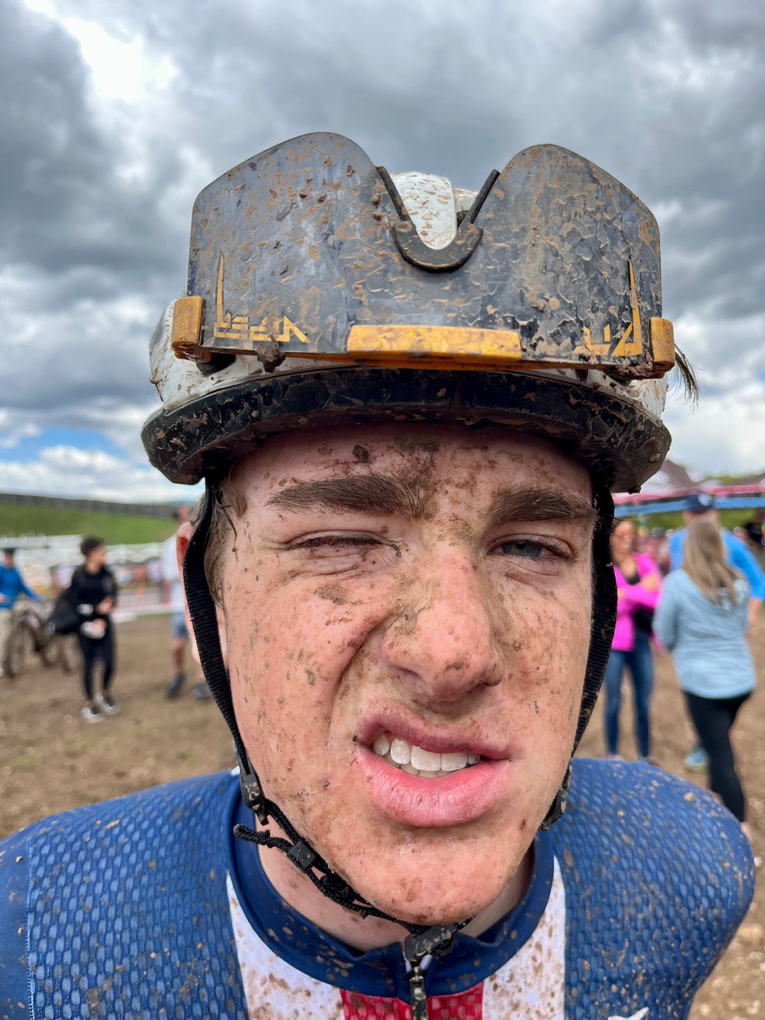 Jibe factory rider Miles Baker mud covered after a race.