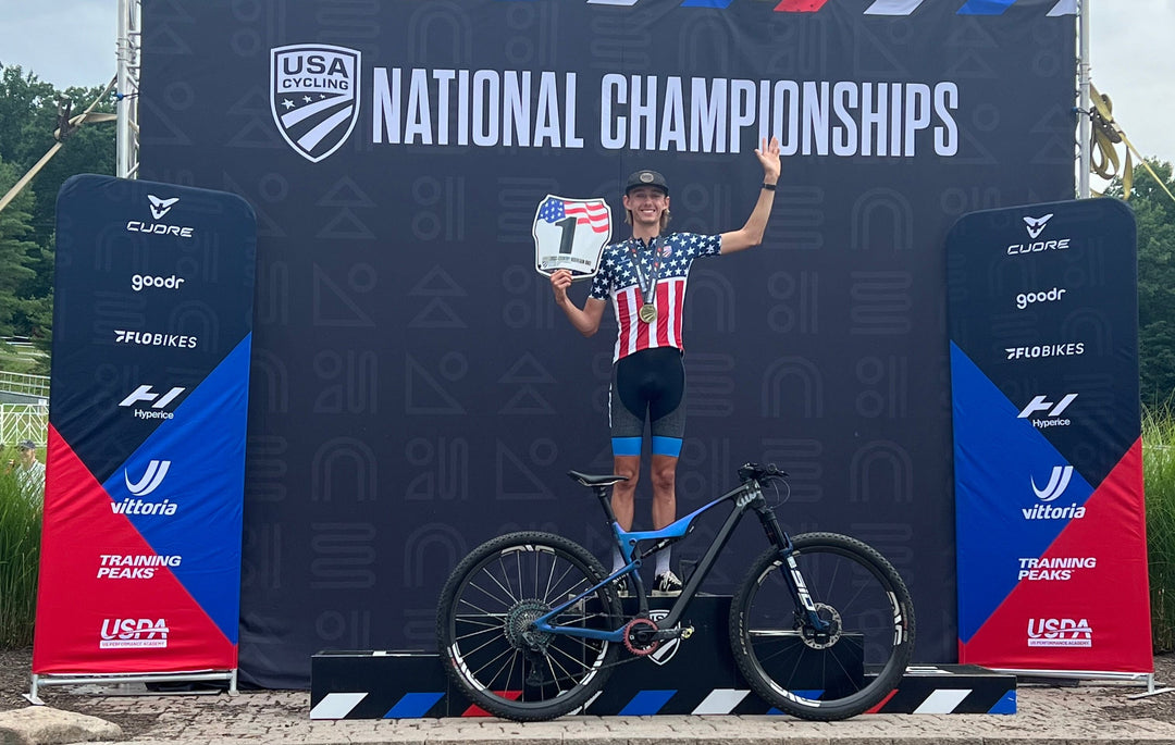 Accel Cycling racer Jordan Porter winning the 2024 USA Cycling National Championship in his Jibe Fully with rockshox SID fork and shock and Sram level ultimate brakes